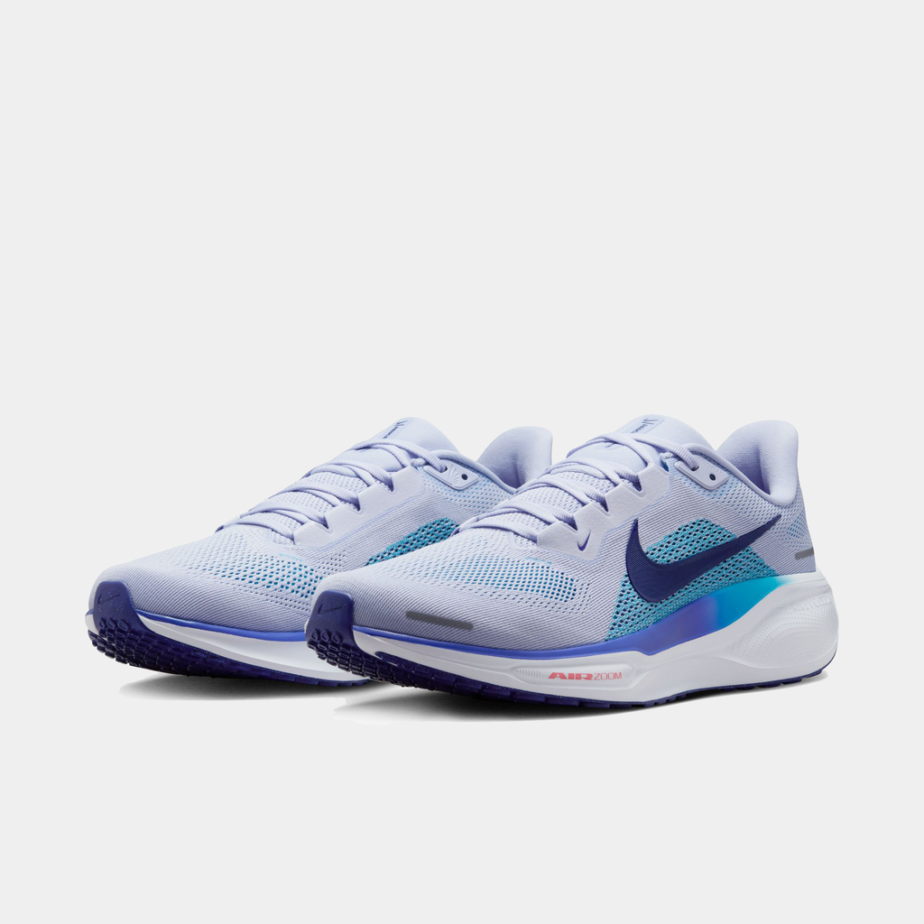 A pair of white Nike Air Zoom Pegasus 41 running shoes with black and blue accents and a black and white sole.