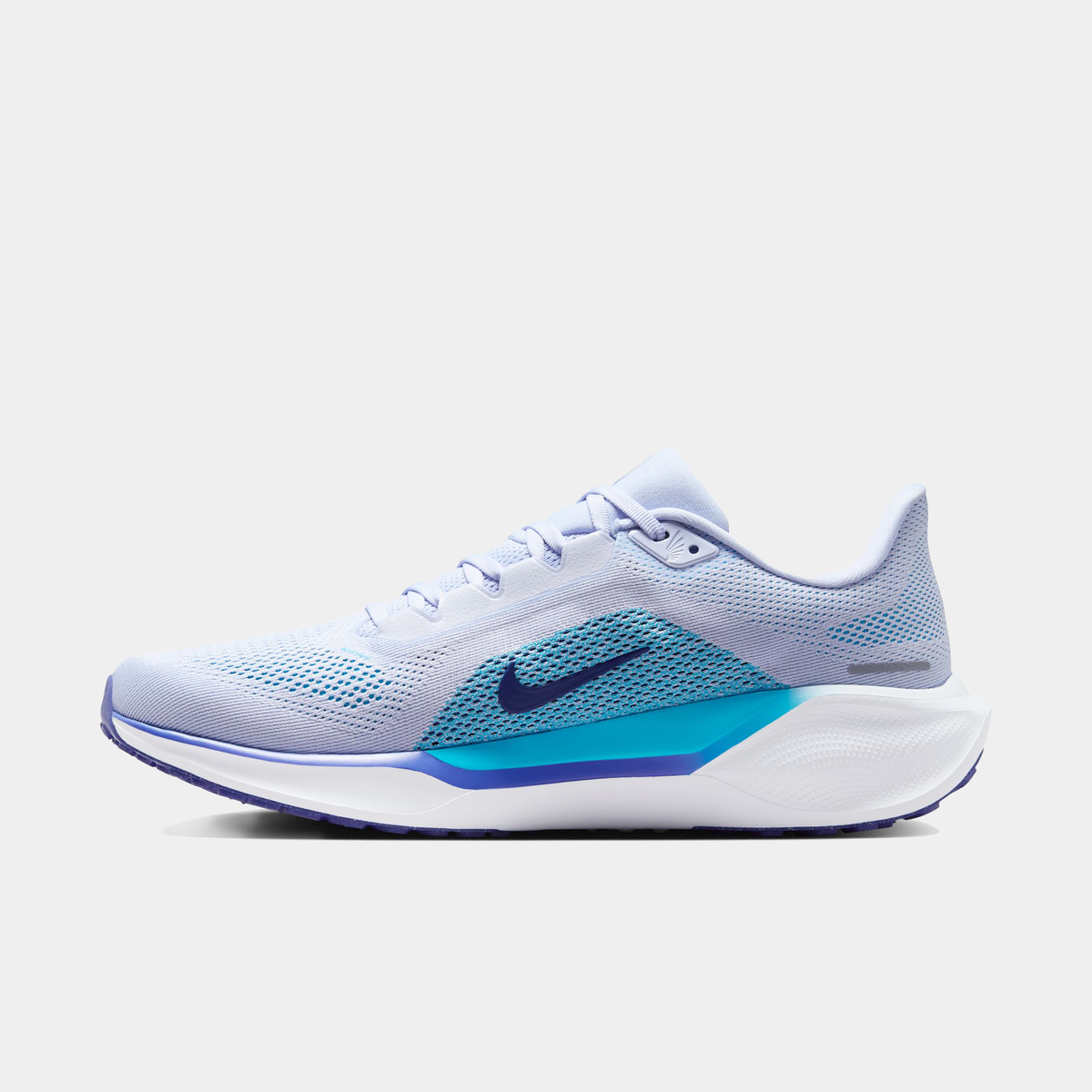 A pair of white Nike Air Zoom Pegasus 41 running shoes with black and blue accents and a black and white sole.