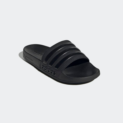 Adidas Adilette Shower Slides in black with textured strap and molded footbed, angled front view.
