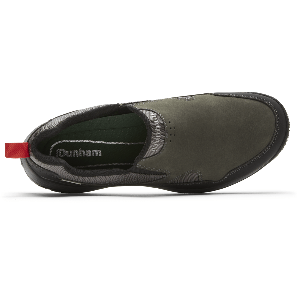 Dunham Cloud Plus Waterproof Slip-On shoes top view, featuring olive-green leather upper, black details, and red pull tab.