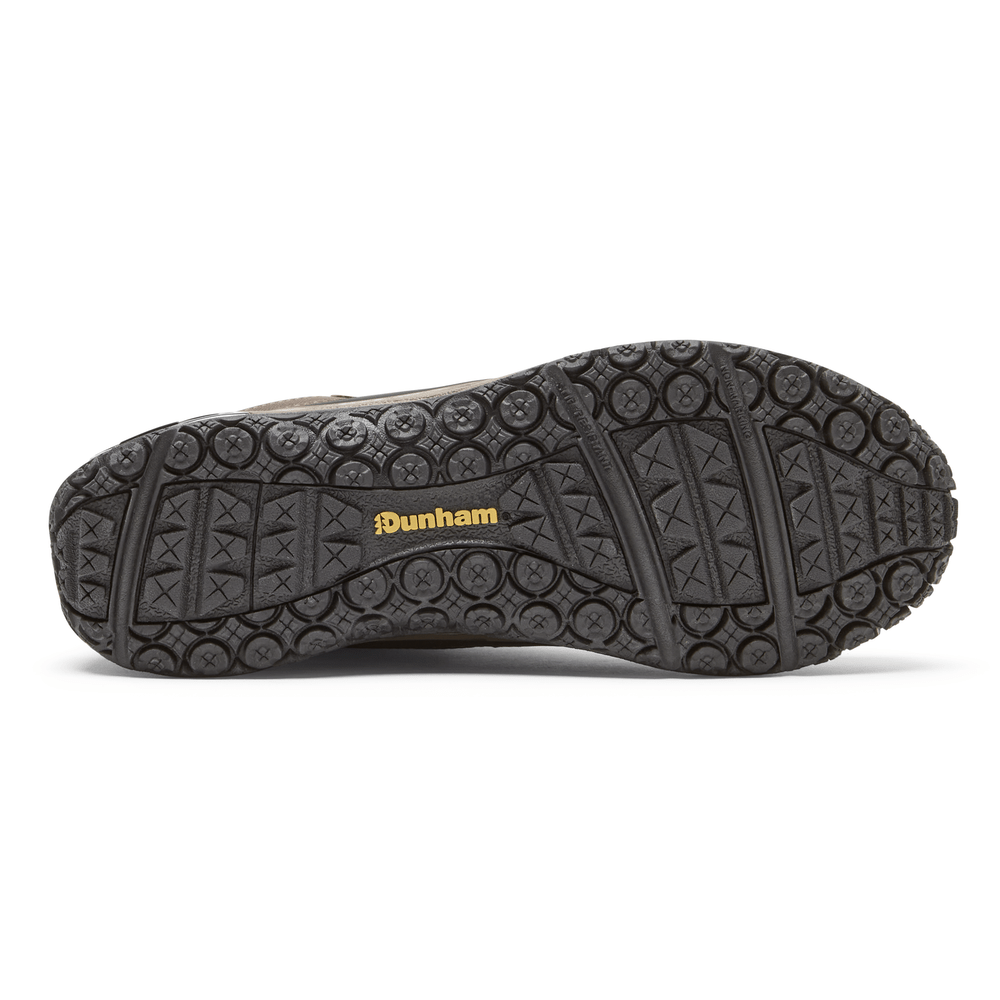 Dunham Cloud Plus Mid II hiking boots outsole with durable black rubber tread pattern and yellow branding, sole/bottom view.