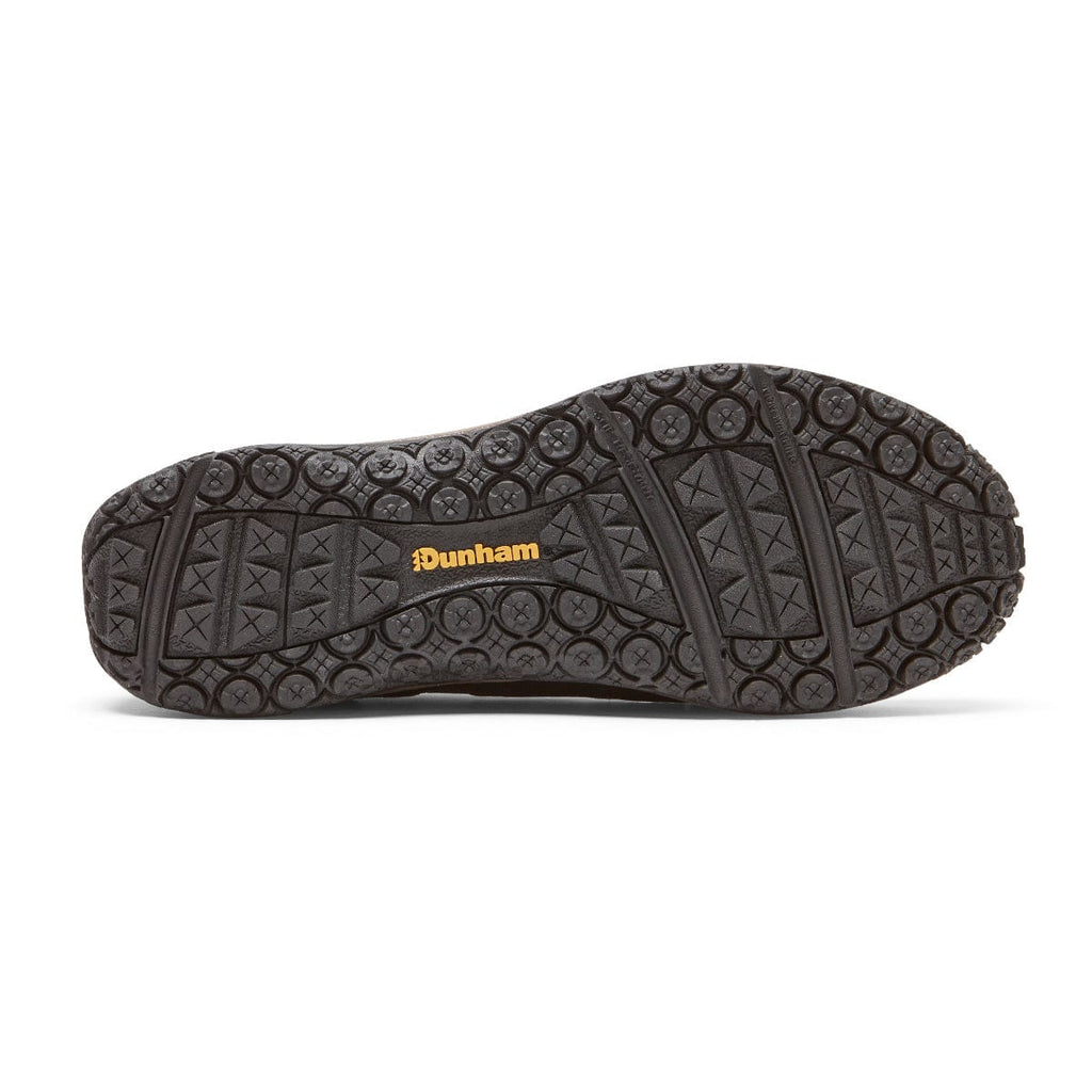 Dunham Cloud Plus Waterproof Slip-On shoe outsole in black with textured grip pattern and Dunham logo in yellow.
