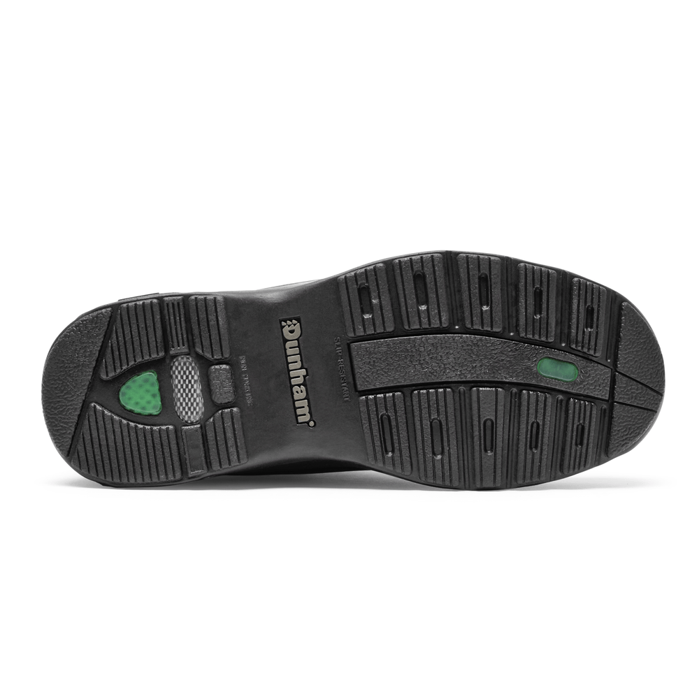 Dunham 8000 Mid Waterproof Boot outsole with slip-resistant tread design and green accents, sole/bottom view.