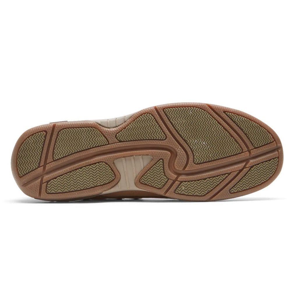 Dunham Captain shoe outsole in beige and brown rubber with wave-patterned tread for durability and traction.