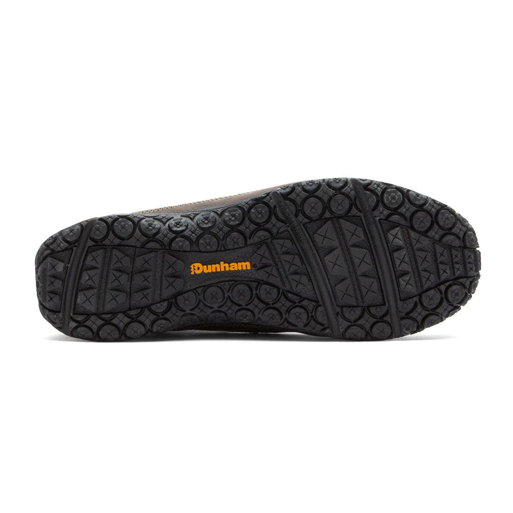 Dunham Cloud Boots outsole in black with textured grip patterns and orange branding, sole/bottom view.