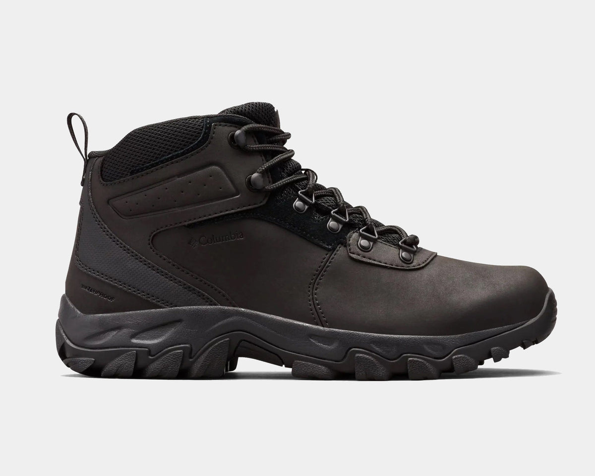 Columbia Newton Ridge Plus II Waterproof hiking boots in all-black leather with durable lace system and rugged outsole, side view.