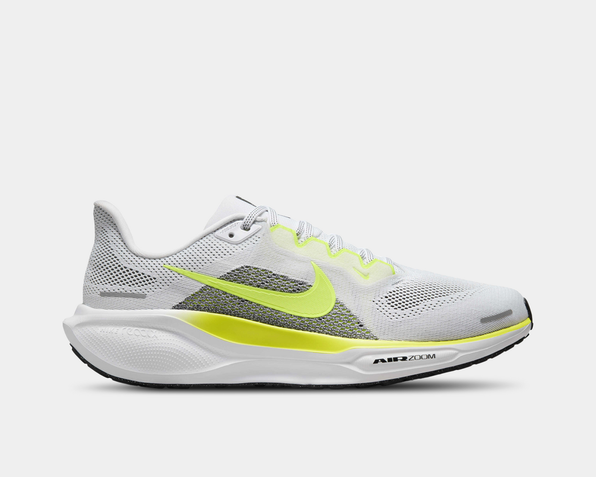 A pair of white Nike Air Zoom Pegasus 41 running shoes with yellow and grey  accents and a white and black sole.
