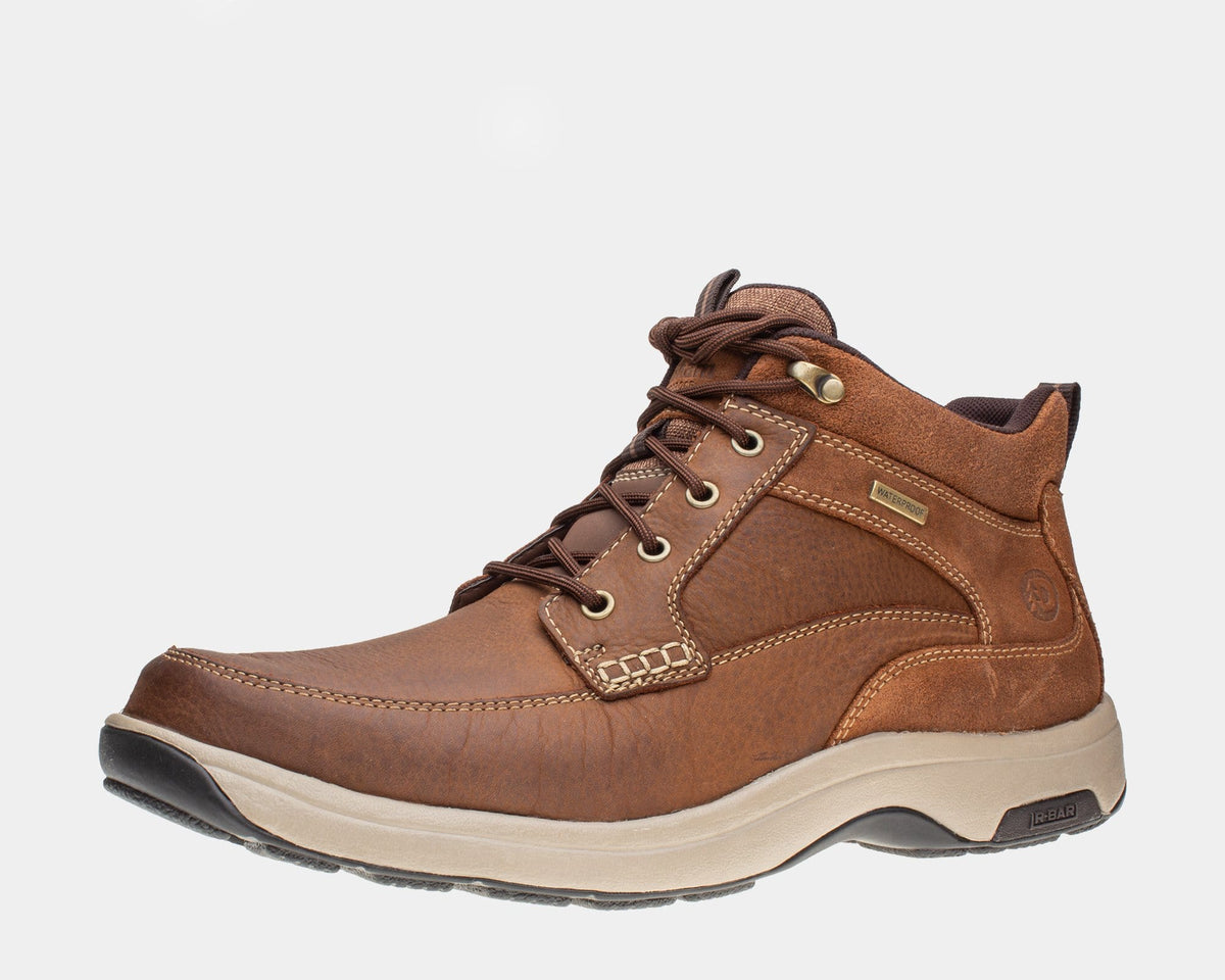 Dunham 8000 Mid Waterproof Boot in brown leather with contrast stitching, metal eyelets, and beige sole, side angle view.