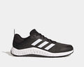 Adidas Everyset Trainer shoes in black with white accents, featuring mesh upper, cushioned midsole, and dual-density outsole, side view.