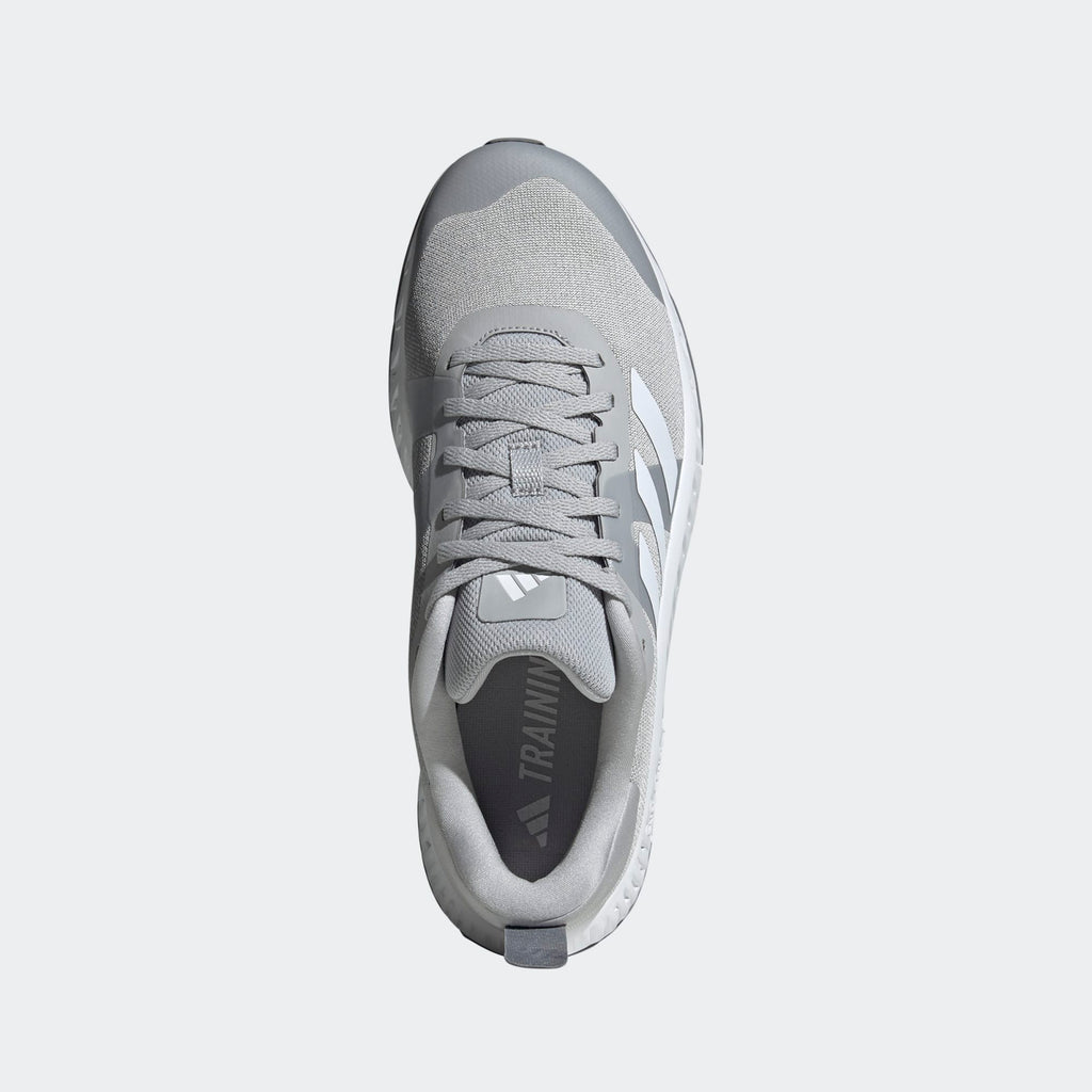 Adidas Everyset Trainer shoes in light gray with mesh upper, lace-up closure, and branded insole, top view.