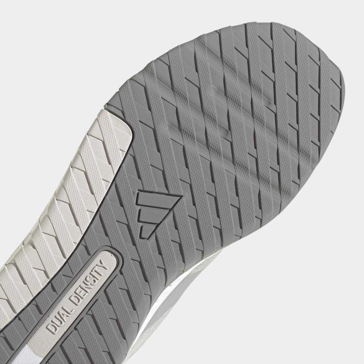 Adidas Everyset Trainer outsole with dual-density design and textured gray rubber pattern, bottom view.