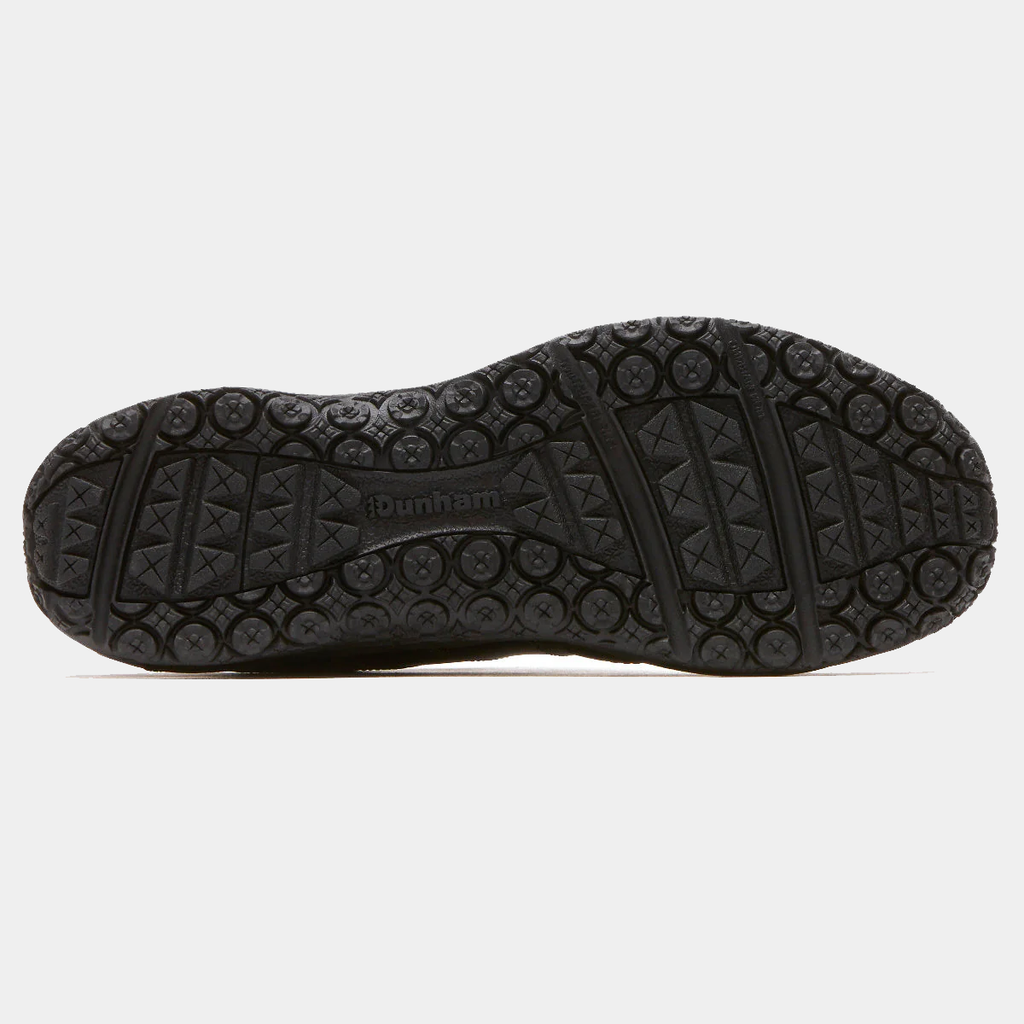 Dunham Cloud Boots outsole in black with durable circular tread pattern and branded logo, bottom view.