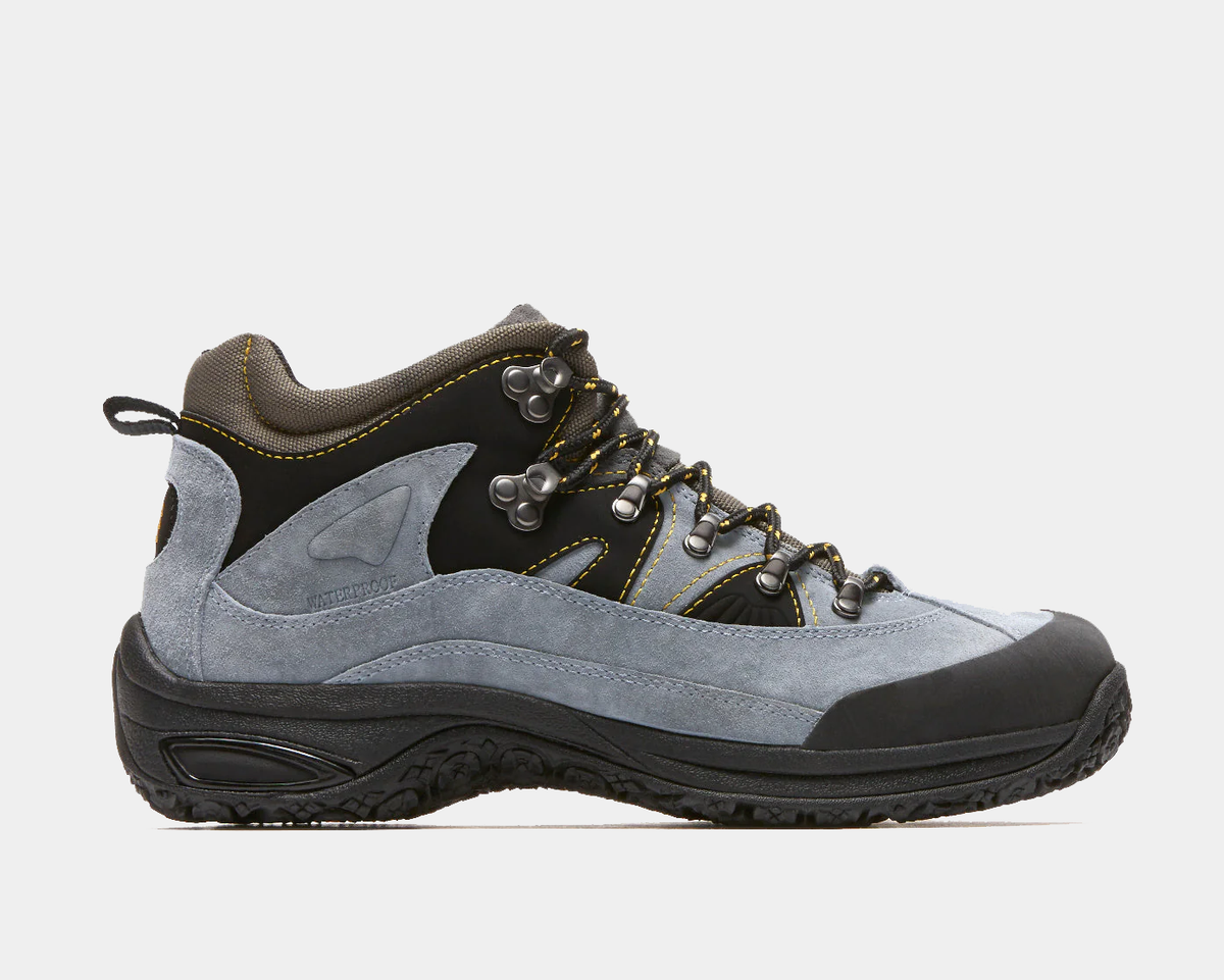 Dunham Cloud Boots hiking boots in gray and black suede with waterproof construction, metal eyelets, and rugged outsole, side view.
