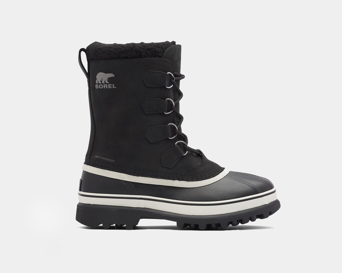 Sorel Caribou Winter Boots in black with waterproof leather, insulated lining, rubber outsole, and lace-up closure, side view.