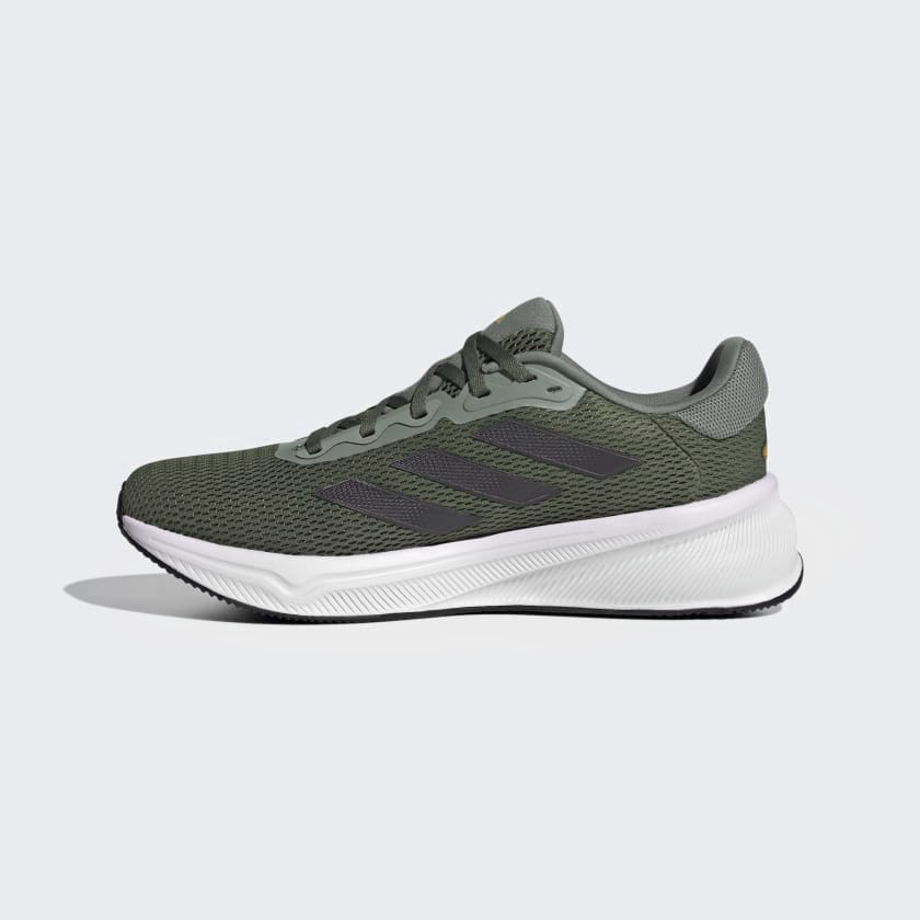 Adidas Response running shoes in dark green with breathable mesh upper, black stripes, and cushioned white midsole, side view.