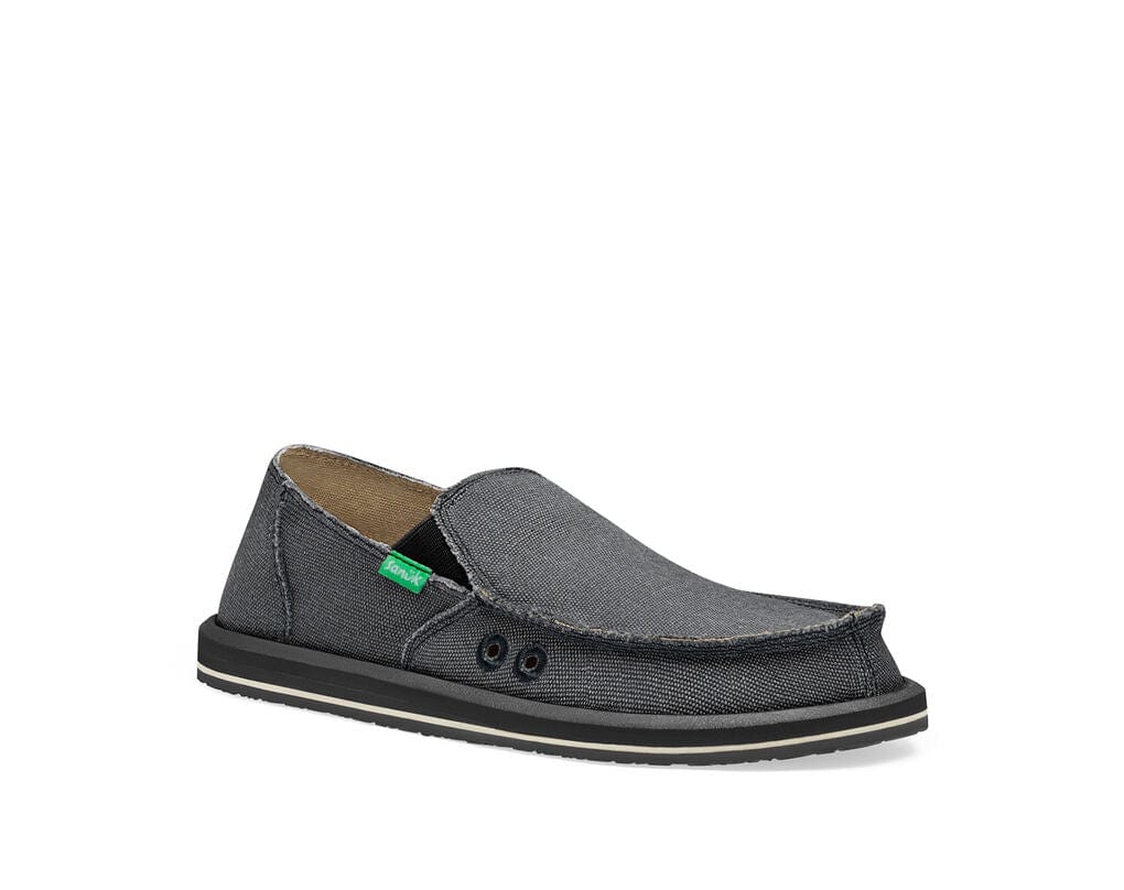Sanuk Vagabond slip-on shoes in dark gray canvas with frayed edges, dual grommet detailing, and flexible rubber sole, side view.