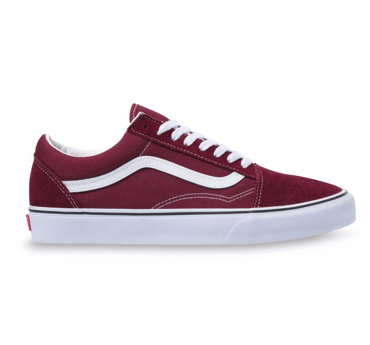 Vans Old Skool sneakers in burgundy suede and canvas with white leather side stripe, white laces, and vulcanized sole, side view.