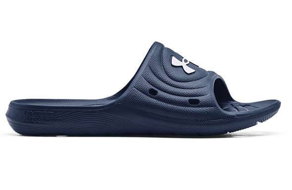 Under Armour Locker IV SL slide sandals in navy blue with perforated design and textured footbed, side view.