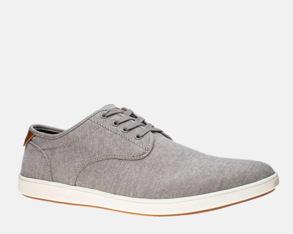 Steve Madden Fenta casual shoes in gray textile upper with lace-up closure and white outsole, side view.