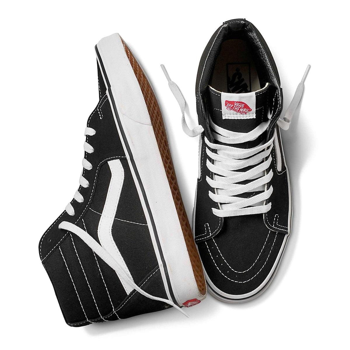 Vans Sk8-Hi high-top sneakers in black canvas with white leather side stripe, contrast stitching, and white laces, top and side view.