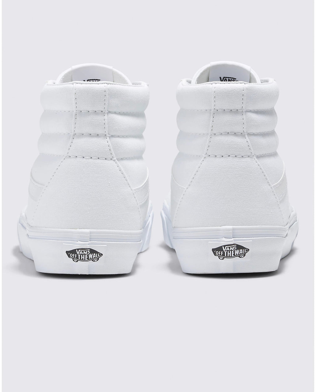 Vans Sk8-Hi sneakers in white canvas with padded collar and signature "Off the Wall" logo detail, back view.
