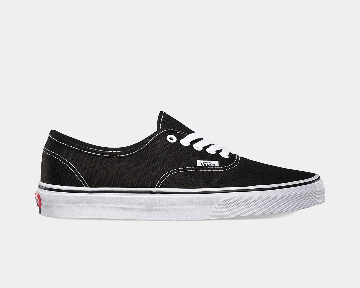 Vans Authentic sneakers in black canvas with white stitching, laces, and rubber outsole, side view.