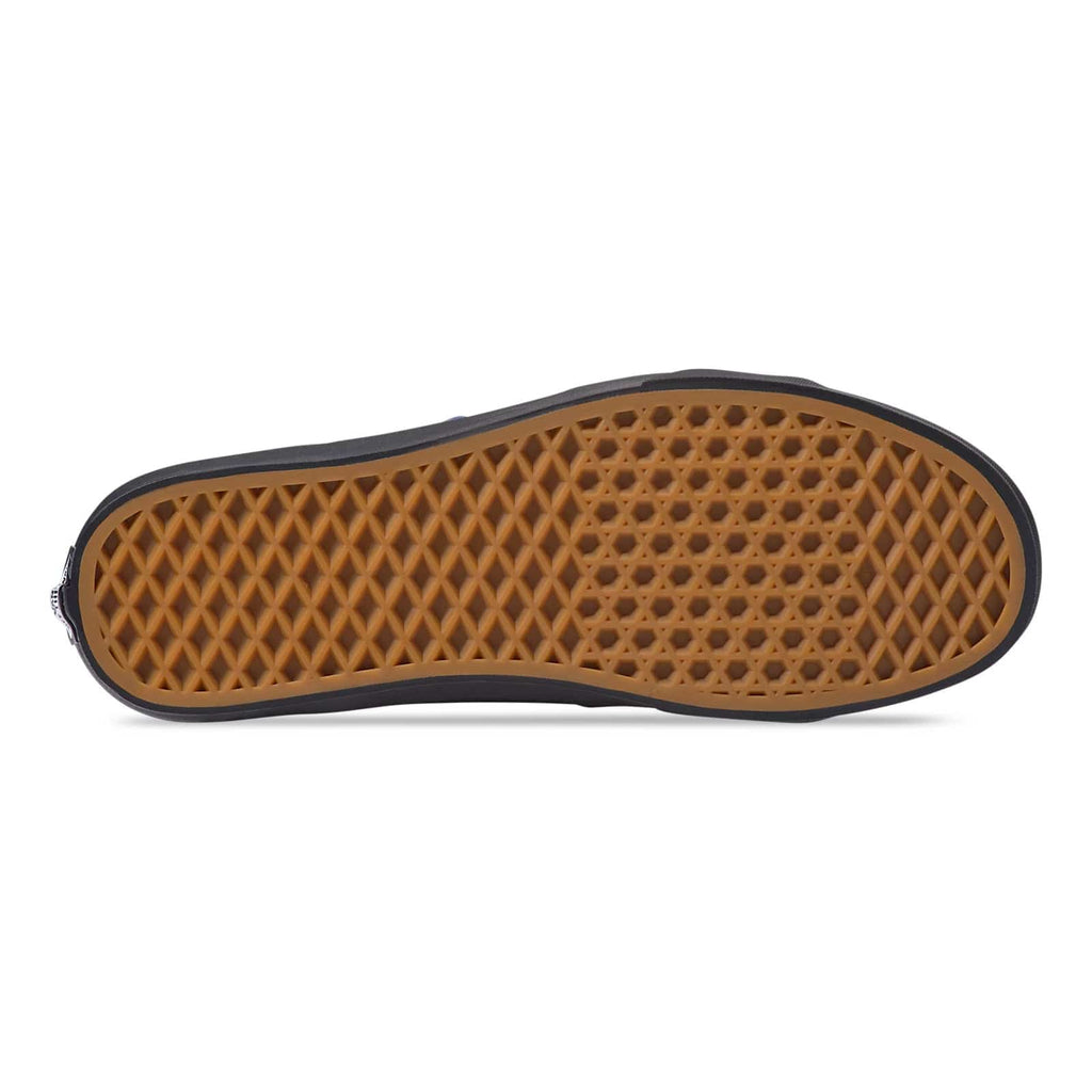 Vans Sk8-Hi sneakers outsole in gum rubber featuring waffle tread pattern, bottom view.
