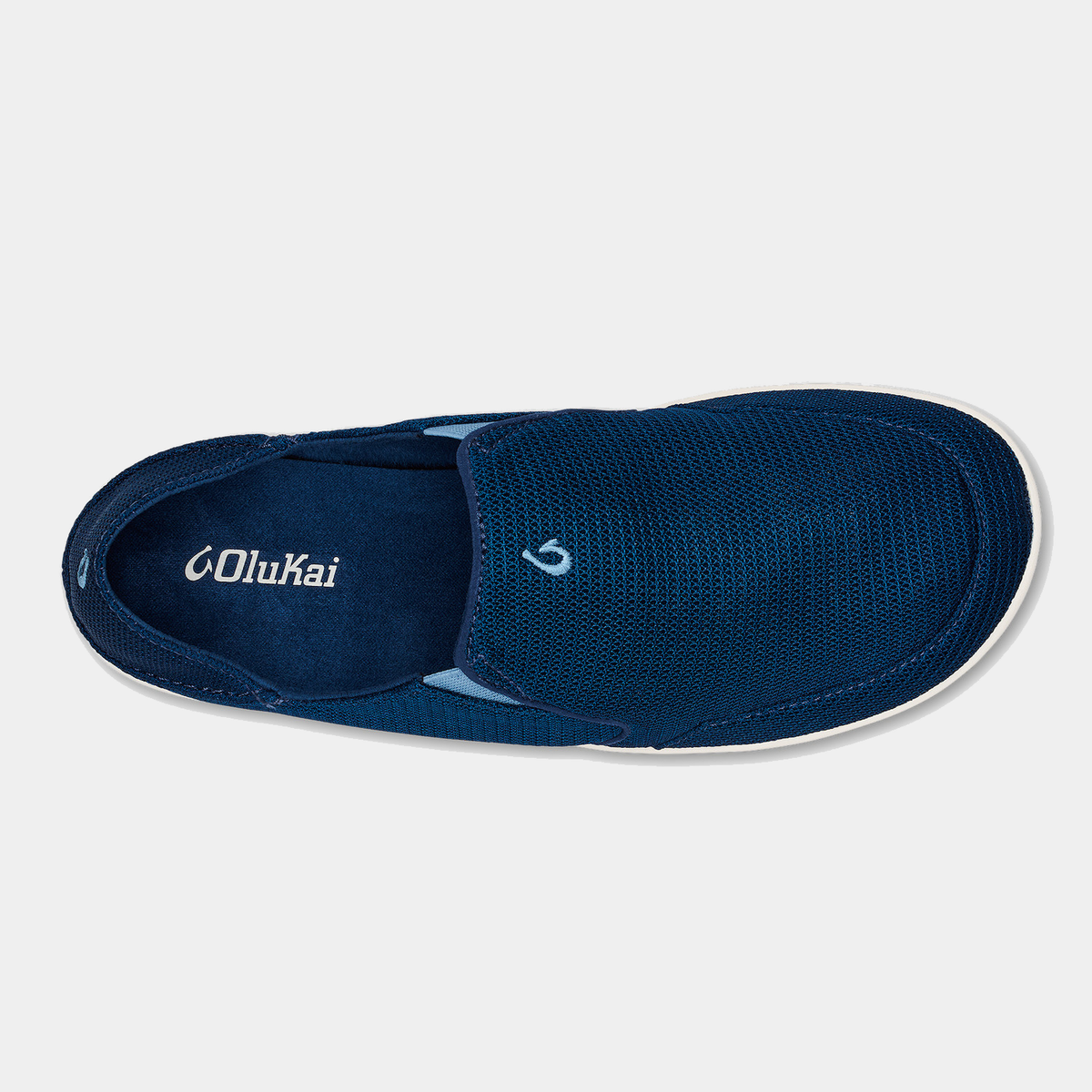 OluKai Nohea Mesh slip-on shoes in deep navy blue with breathable mesh upper and embroidered logo, top view.