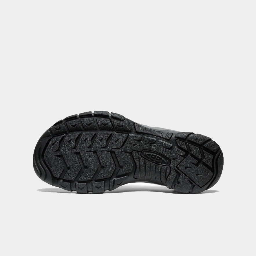 Keen Newport H2 sandal outsole in black rubber with rugged tread pattern, bottom view