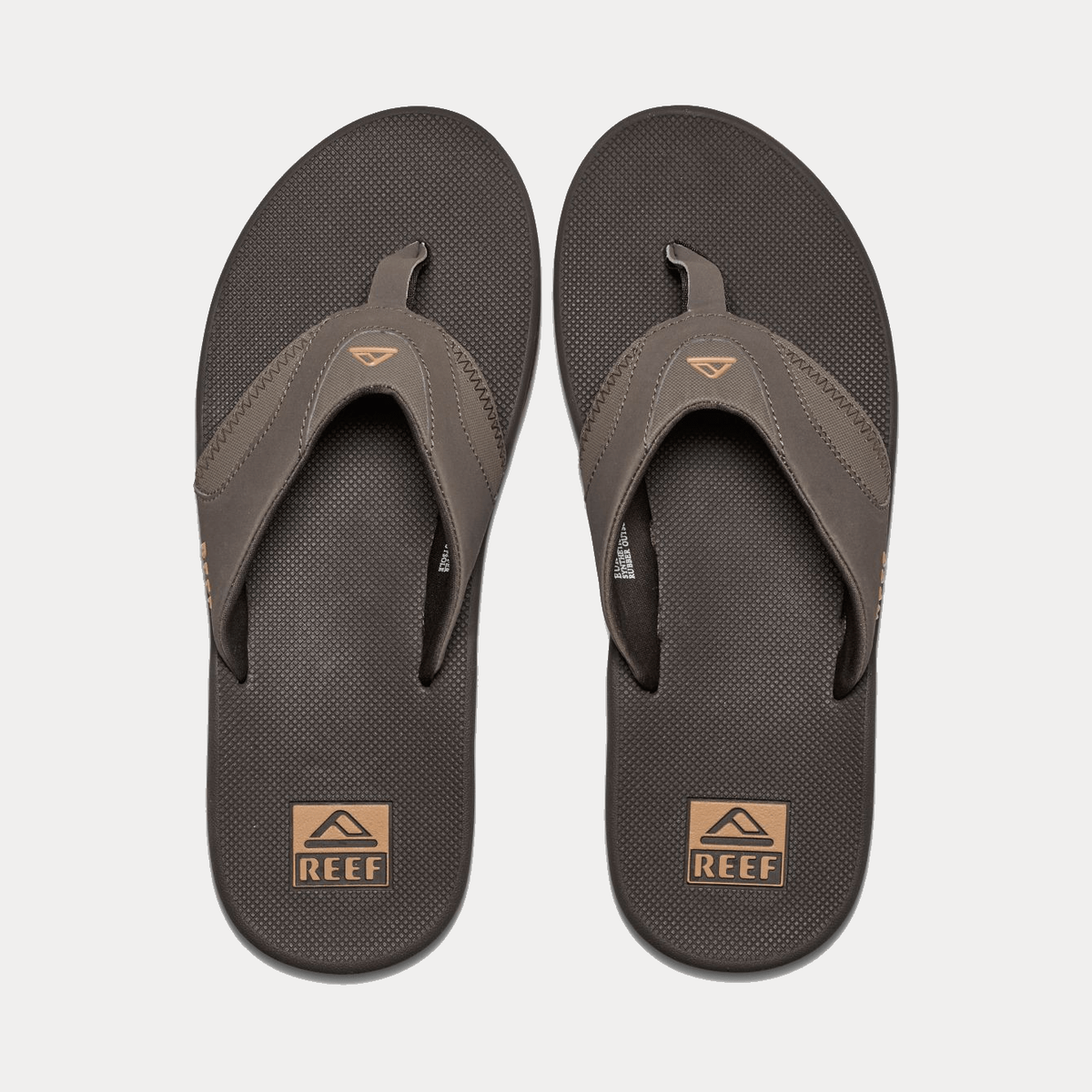 Reef Fanning Flip Flops in brown with synthetic straps and textured footbed featuring a bottle opener, top view.