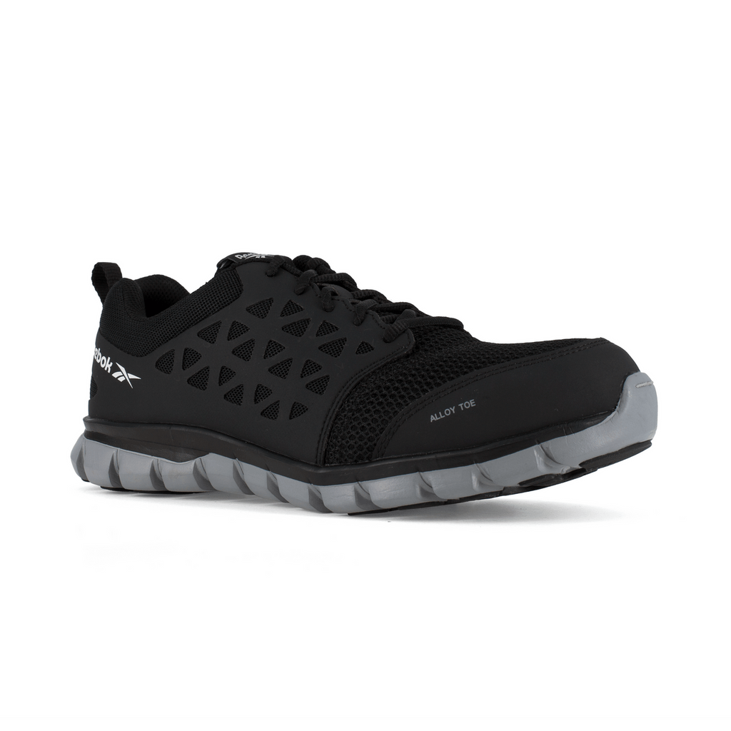 Reebok Work Sublite Cushion Work alloy toe shoes in black with mesh upper and lightweight gray outsole, side angle view