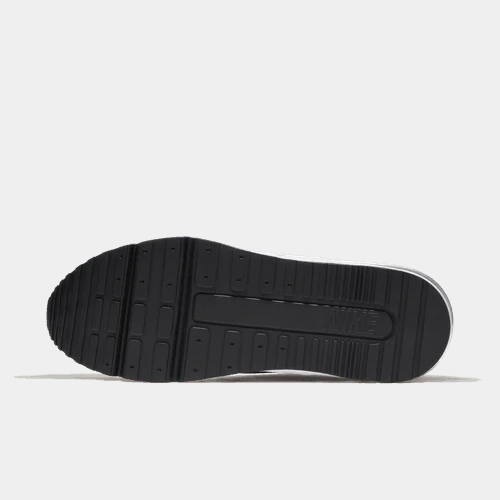 Black sole of a sneaker with Nike logo on a white background