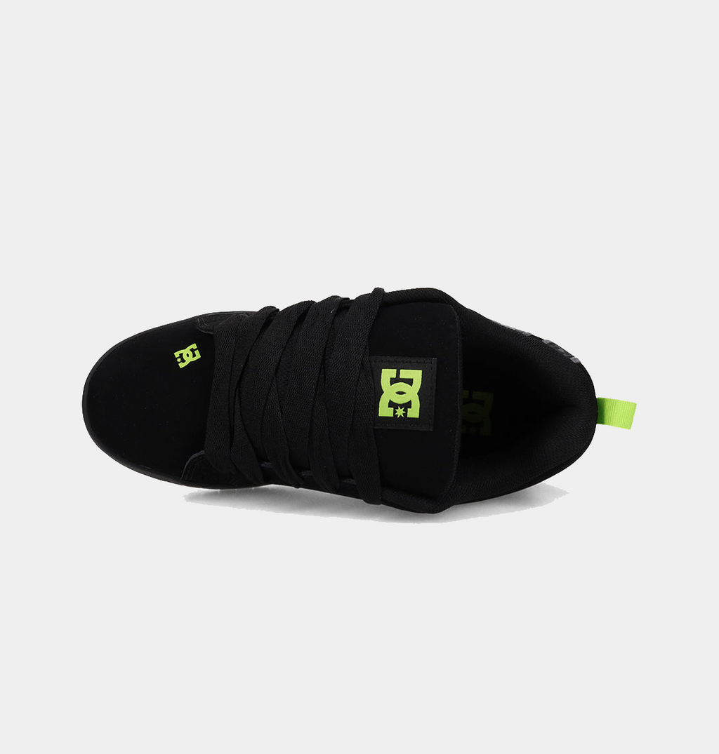 DC Footwear Court Graffik sneakers in black with neon green logo and heel pull tab, top view showing padded tongue and lace system.