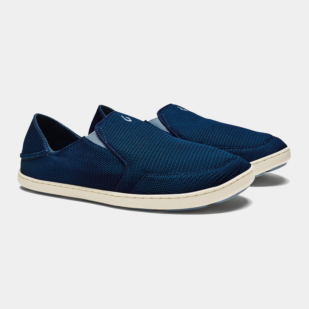 OluKai Nohea Mesh shoes in navy blue with breathable mesh upper and cream-colored sole, side angle view.