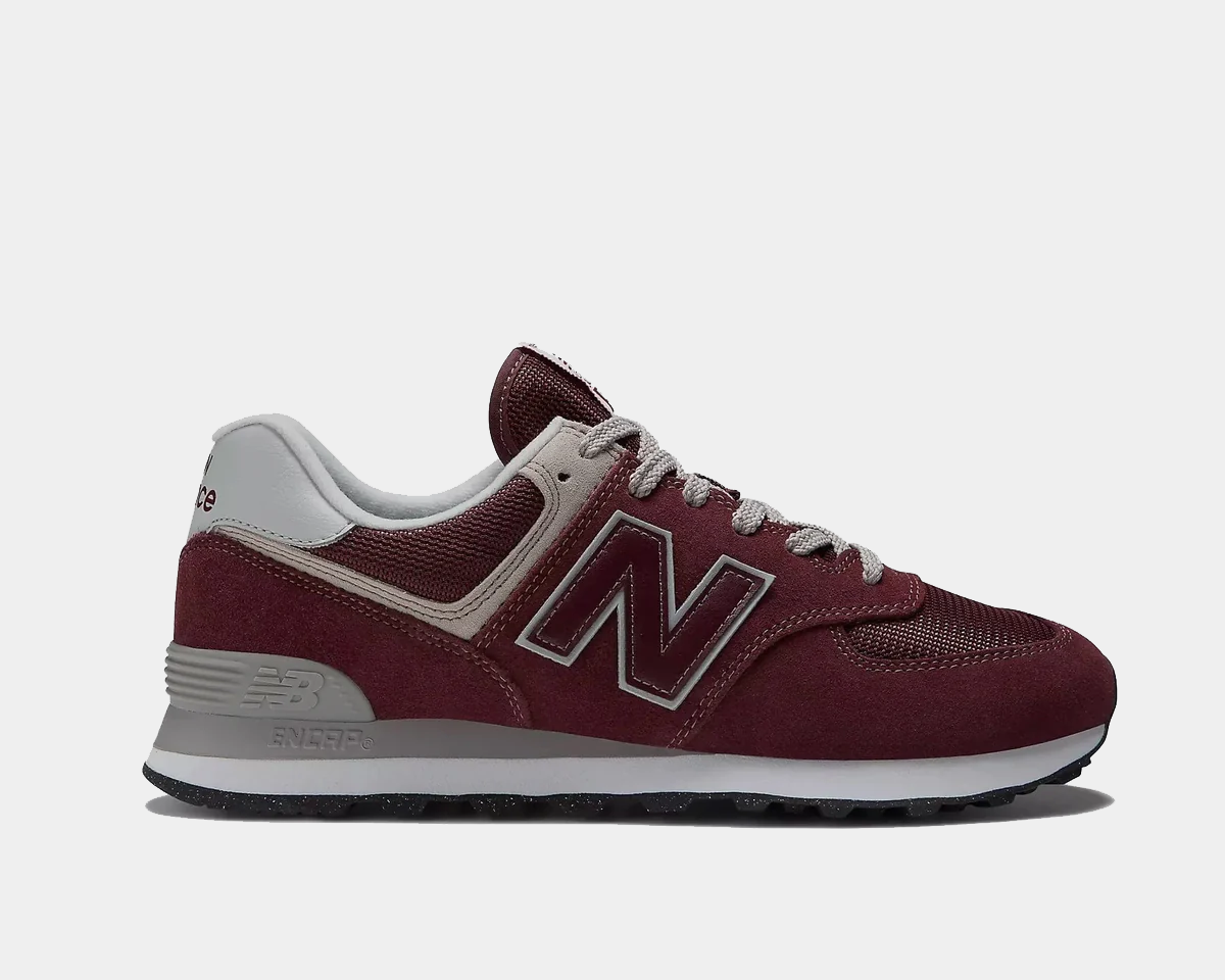 New Balance 574 Core sneakers in burgundy with suede and mesh upper, gray accents, and ENCAP midsole, side view.