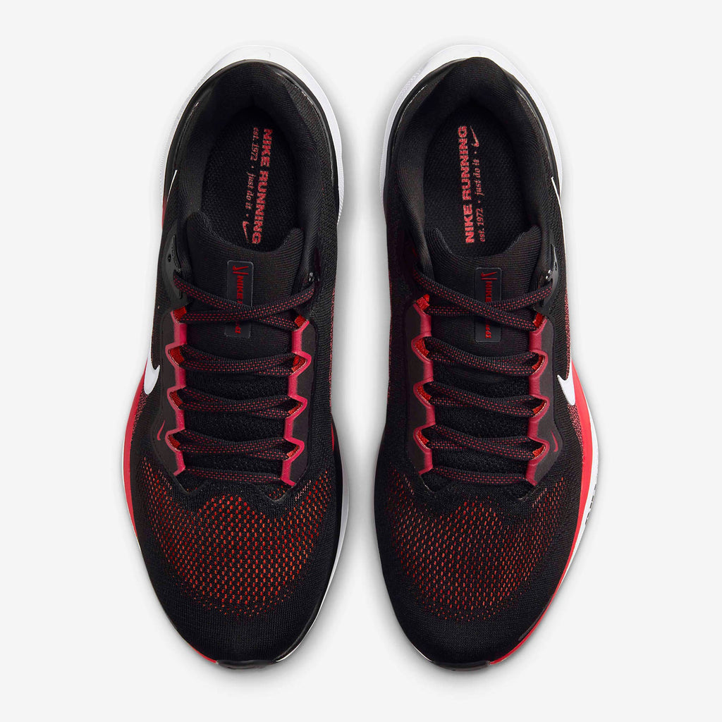 A pair of black Nike Air Zoom Pegasus 41 running shoes with white and red accents .